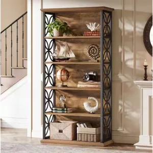 A wooden bookshelf with black decorative side panels features various items like a potted plant, model ship, globe, camera, and decorative sculptures. It also includes storage baskets on the bottom shelf.