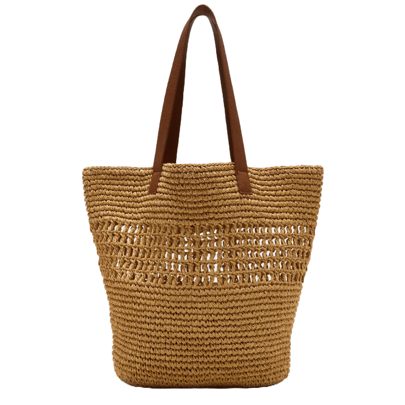 A straw tote with brown handles, featuring a woven design with open patterns in the upper section, ideal for a casual look or beach outing.