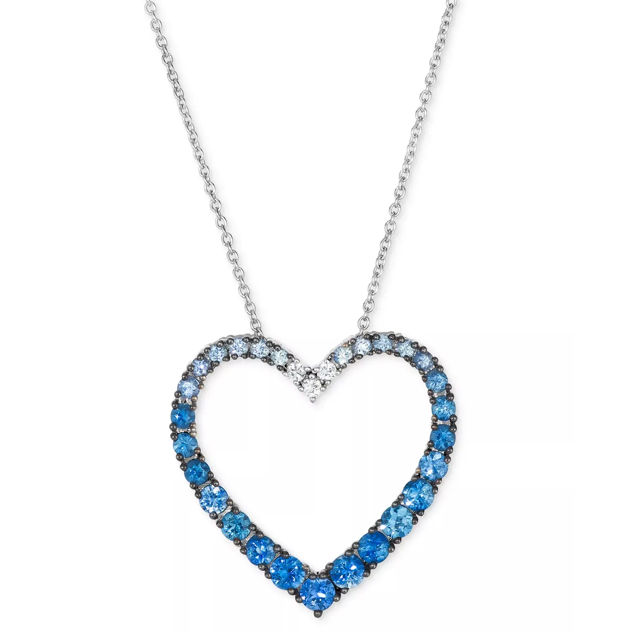 A heart-shaped necklace with a gradient of blue gemstones set in a silver chain.