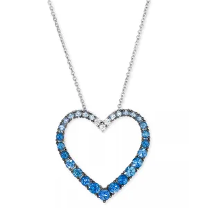 A heart-shaped necklace with a gradient of blue gemstones set in a silver chain.