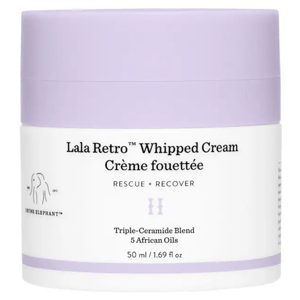 Lala Retro Whipped Cream by Drunk Elephant is a rescue and recover moisturizer featuring a triple-ceramide blend and five African oils, available in a 50 ml (1.69 fl oz) container.
