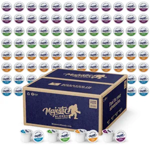 Assorted coffee pods from Majestic Blends, neatly arranged above a large box. Various flavors are indicated by different colored lids: blue, green, orange, and purple.