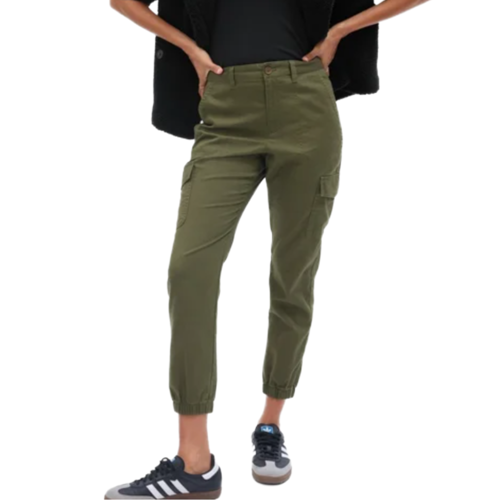 Olive green cargo jogger pants paired with black and white sneakers.