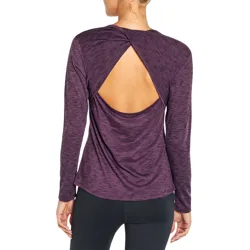 A long-sleeve purple top featuring a cutout design on the back, paired with dark leggings.
