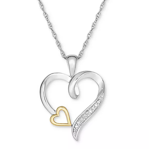A heart-shaped pendant features intertwined silver and gold-tone heart outlines, with a row of small gemstones on the silver part, hanging from a twisted silver chain.
