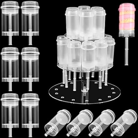 Clear push-up cake pop containers with a stand for display and storage.