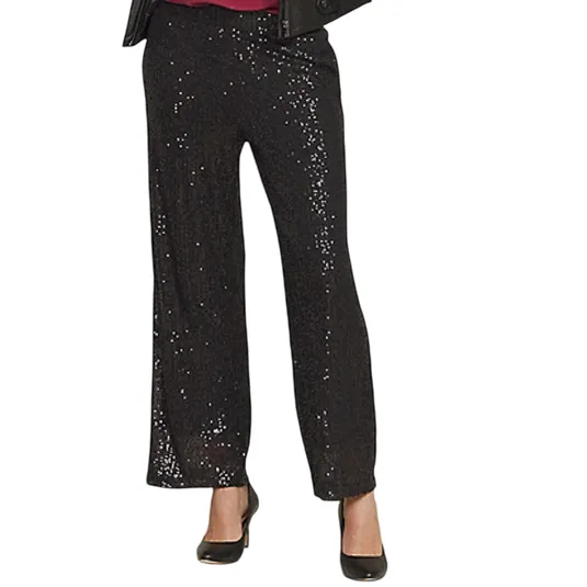 Black sequin wide-leg trousers paired with black heels.