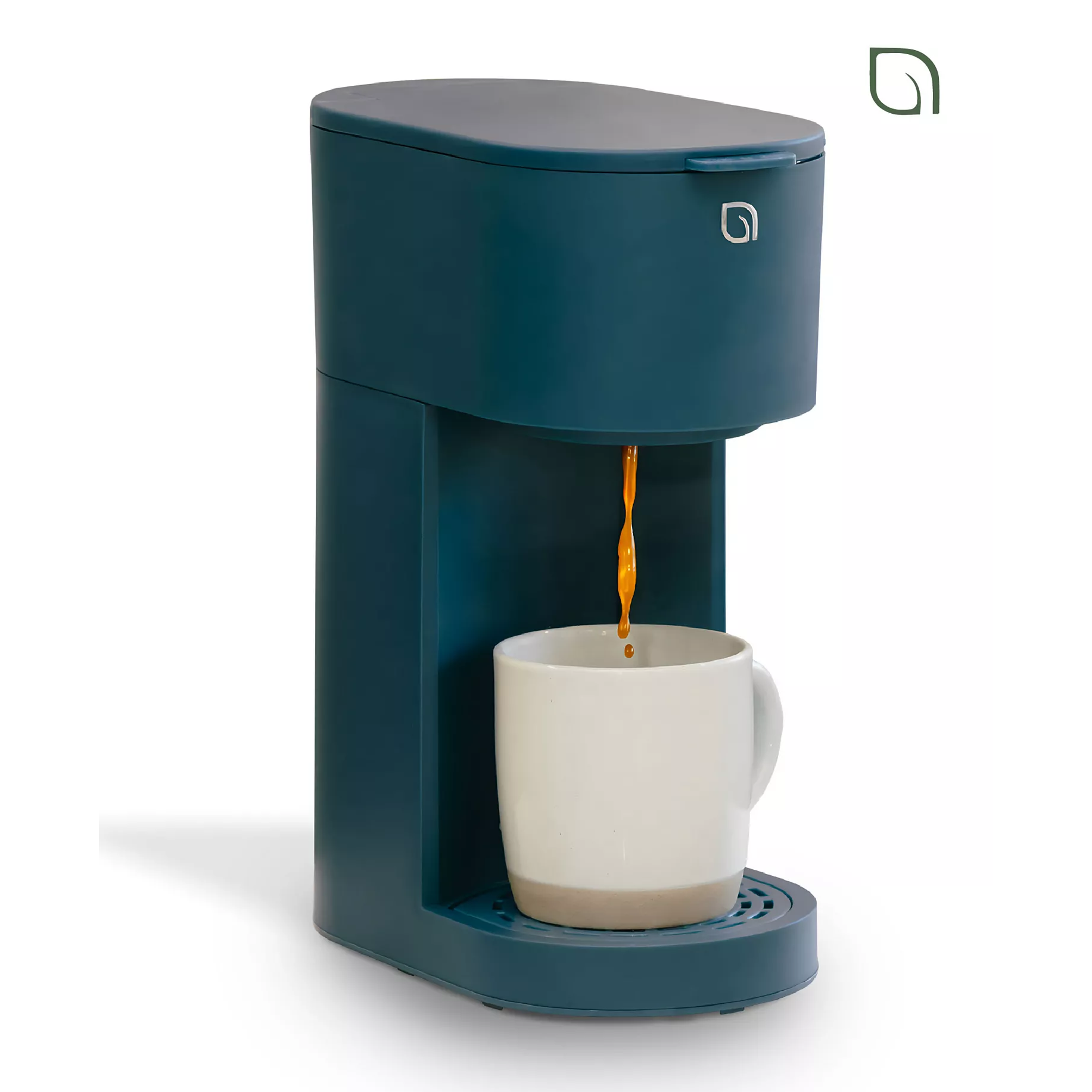 Single-serve coffee maker dispensing coffee into a white mug, featuring a sleek, compact design in dark green.