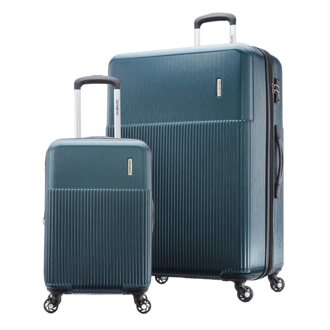 Two blue suitcases with textured surfaces and telescopic handles, featuring four spinner wheels.