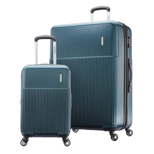 Two blue suitcases with textured surfaces and telescopic handles, featuring four spinner wheels.