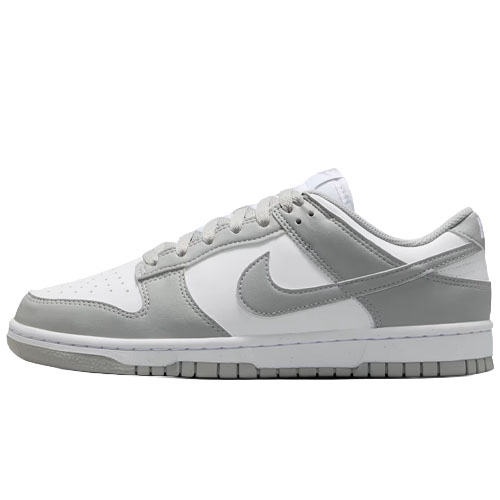 A low-top sneaker in white and grey tones with a distinctive logo on the side, featuring a lace-up design and perforated toe box for breathability.