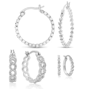 Five pairs of silver hoop earrings, each with unique diamond or crystal designs. Styles vary from simple round hoops with embedded stones to hoops featuring intricate intertwined patterns with studded gems, creating a sparkling, elegant appearance.
