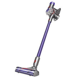 Cordless stick vacuum with a purple wand, featuring multiple attachments including a crevice tool, combination tool, mini motorized tool, soft dusting brush, and a flexible hose.