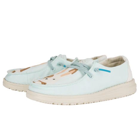Hey Dude Wendy Critter Shoes for toddlers feature a light blue color with a playful critter design on the front, lace-up detail, and a comfortable, cushioned sole ideal for casual wear.