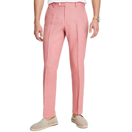 A person is wearing pink tailored pants paired with light-colored espadrilles and a watch.