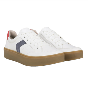 White low-top sneakers with a gum sole, featuring a blue side stripe and red heel accent.