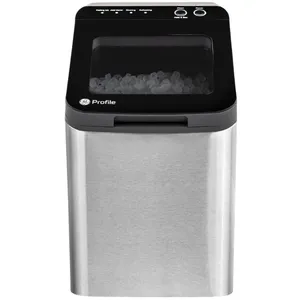 A stainless steel GE Profile countertop ice maker with a transparent top, showing ice cubes inside.