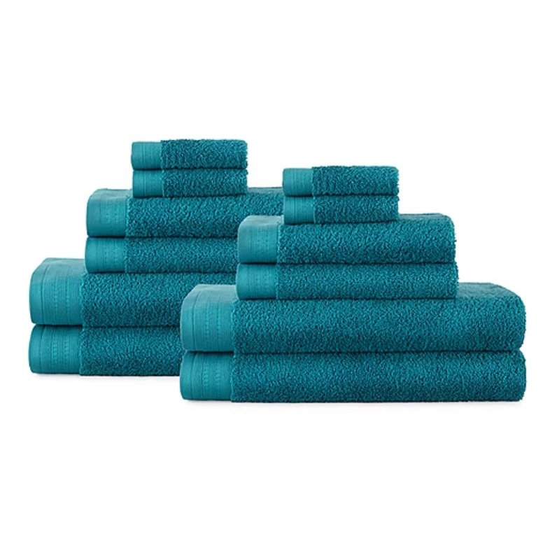 A set of teal towels in three sizes, neatly stacked.