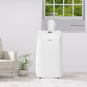 A portable Amana air conditioner with a vent hose is positioned in front of a window in a room, featuring digital controls and a modern design.