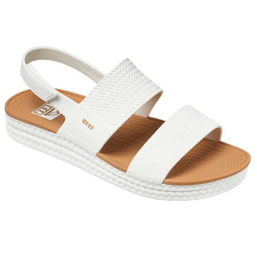 White sandal with a textured sole and two straps across the upper foot, featuring a slingback for added support.