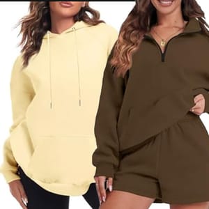 Two women wearing casual hooded sweatshirts, one yellow and one olive green.