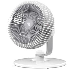 A modern, gray and white oscillating table fan with a circular design and angled blades on a sleek base.