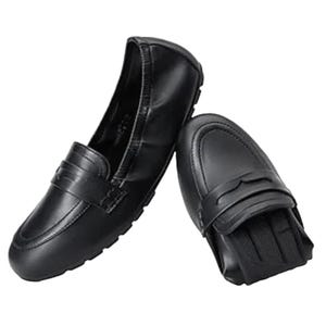 Black leather loafers with a strap detail, featuring a flexible, foldable sole design.