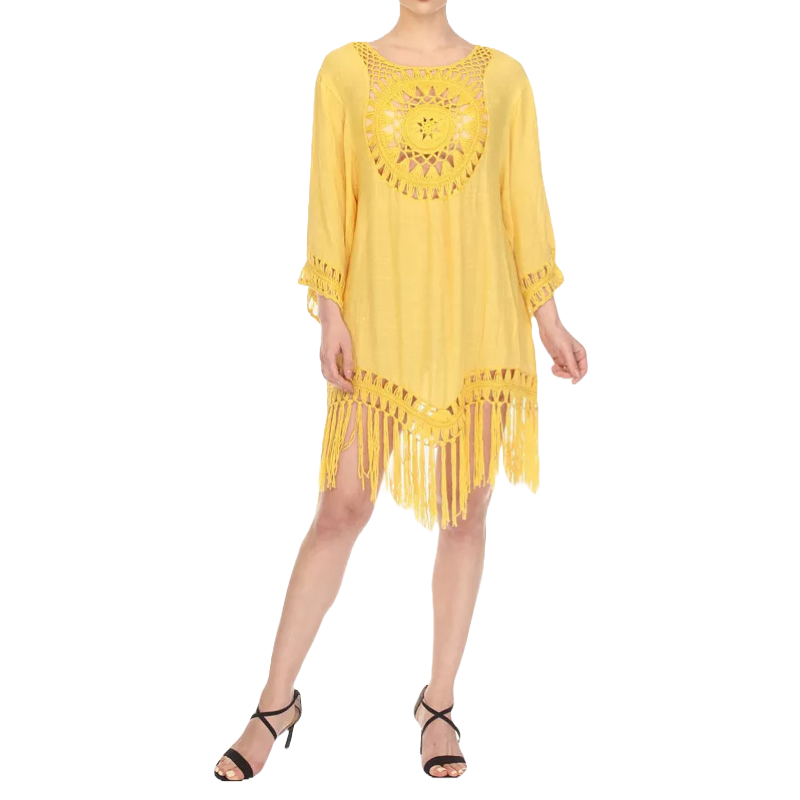 Yellow crocheted cover-up dress featuring a circular crochet pattern on the front and fringed hem and sleeves, worn with black strappy heels.