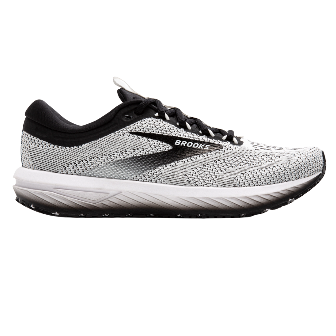 A gray and white athletic running shoe with black accents and the word \“Brooks\“ on the side, featuring a cushioned sole and mesh upper.