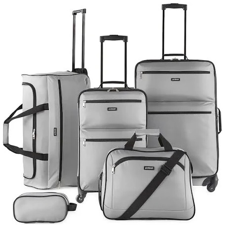 A set of five silver-gray travel bags including suitcases, a duffle, a tote, and a small pouch, all with black trim and handles.