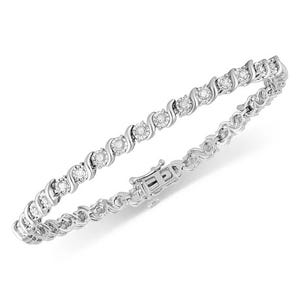 A silver bracelet with a swirl design featuring small circular gemstones evenly spaced along its length.
