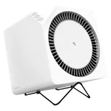 A white electronic air purifier with an angular design and a circular vent, featuring control buttons on top and supported by a black stand.