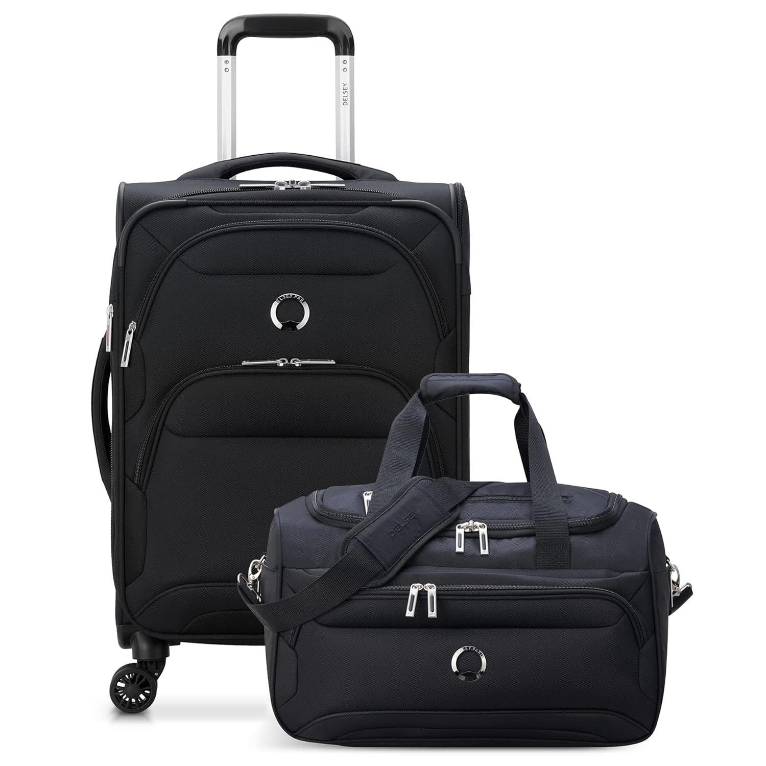 Two black pieces of luggage from Delsey Paris: a wheeled carry-on suitcase and a duffel bag. Both feature silver zippers, a circular logo, and reinforced handles, with the suitcase also having an extendable handle and four wheels for easy transport.