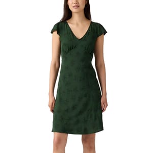 A green, short-sleeved dress with a V-neckline and subtle floral pattern, worn by a woman.