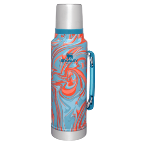 Stanley Classic Legendary Bottle with a vibrant orange and blue swirl design, featuring a silver cap, teal handle, and durable stainless steel construction for hot and cold beverages.