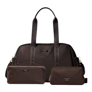 A set of three dark brown bags, including a large tote with \“Kate Spade New York\“ straps and two smaller accessory pouches with logo plaques.