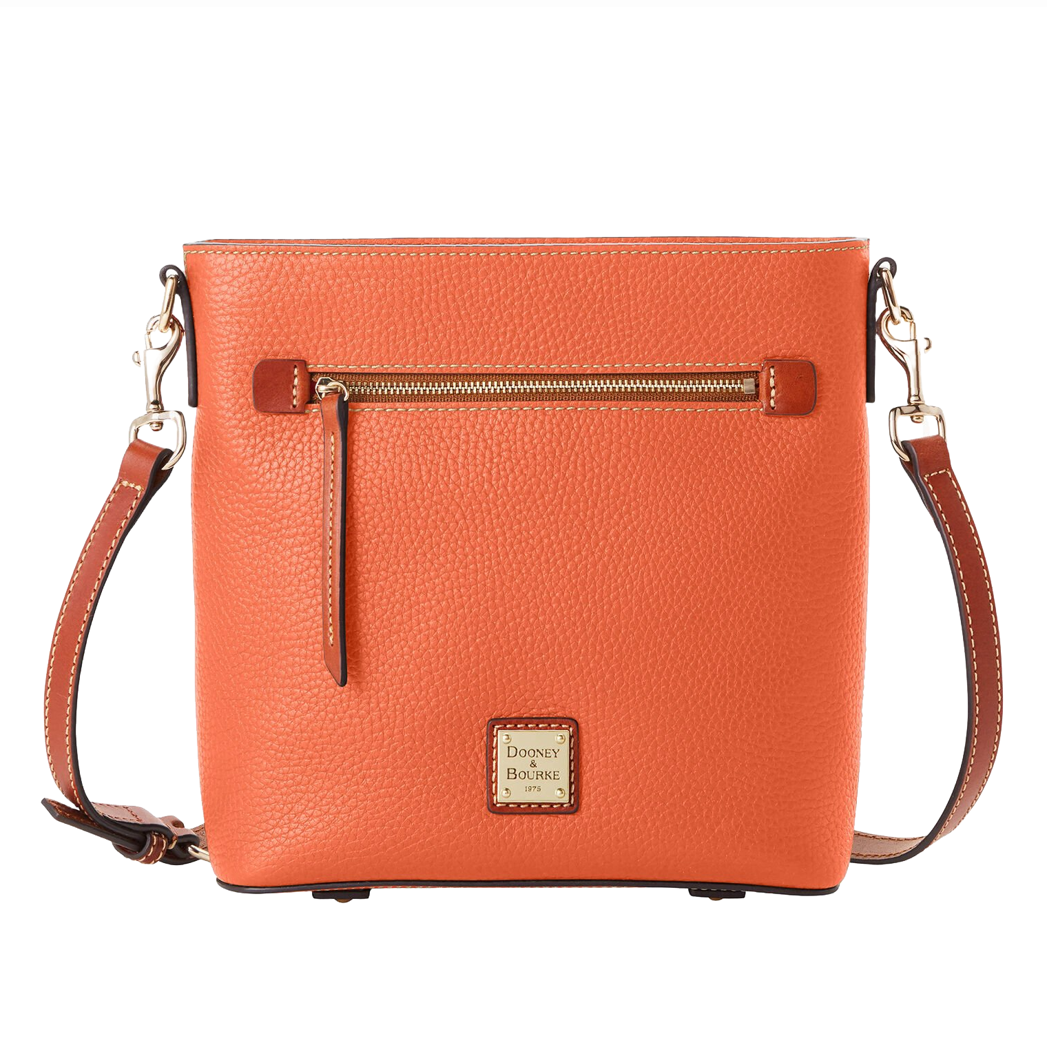 Orange pebbled leather crossbody bag with a front zipper pocket, adjustable strap, and a Dooney & Bourke logo patch.