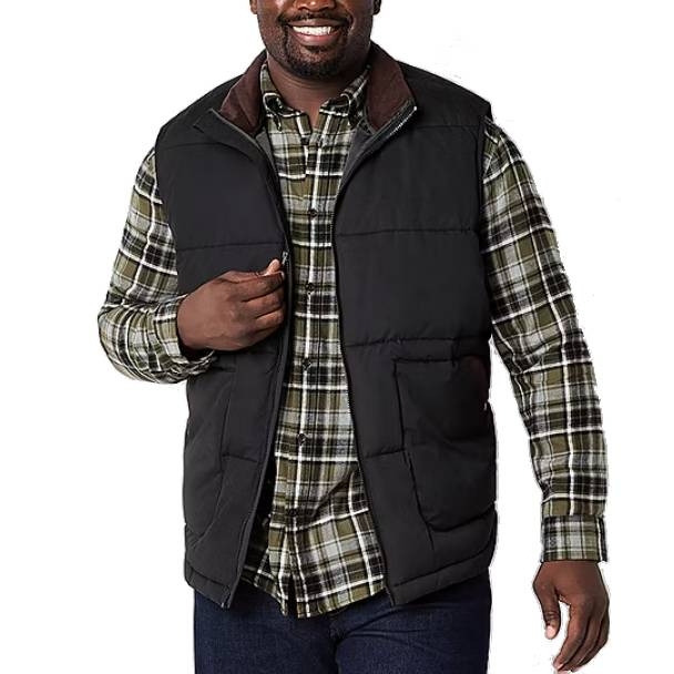 A man is wearing a black Big & Tall puffer vest over a plaid shirt, featuring a zippered front and side pockets.