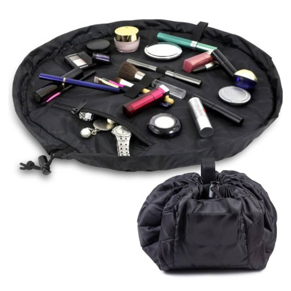 A black makeup bag is laid flat showcasing various cosmetics and accessories; the same bag is shown closed beside it.