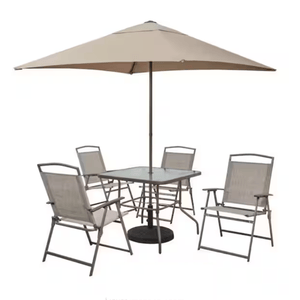 A patio set featuring a square glass table with a beige umbrella and four foldable chairs.
