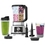 Blender set including a large blender jar loaded with ingredients, two to-go cups with lids, ice crusher, and blending accessories.