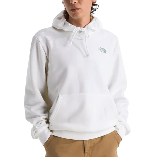 A person is wearing a white The North Face hoodie with a small logo on the chest, paired with brown pants.
