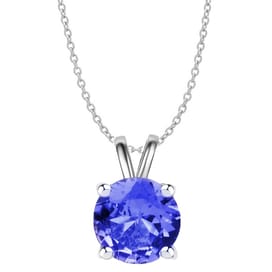 A necklace featuring a round blue gemstone set in a four-prong silver pendant, attached to a delicate silver chain.