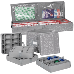 A set of gray storage organizers for holiday items, featuring compartments for wrapping paper, gift bags, ribbons, and ornament containers with adjustable dividers, all adorned with a snowflake pattern.