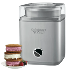 Cuisinart 2-quart frozen yogurt, sorbet, and ice cream maker with a stainless steel finish, alongside a plate of ice cream sandwiches with berries.