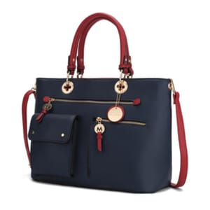 A stylish handbag with a navy blue body and red handles, featuring gold accents, a front pocket, and a detachable strap.