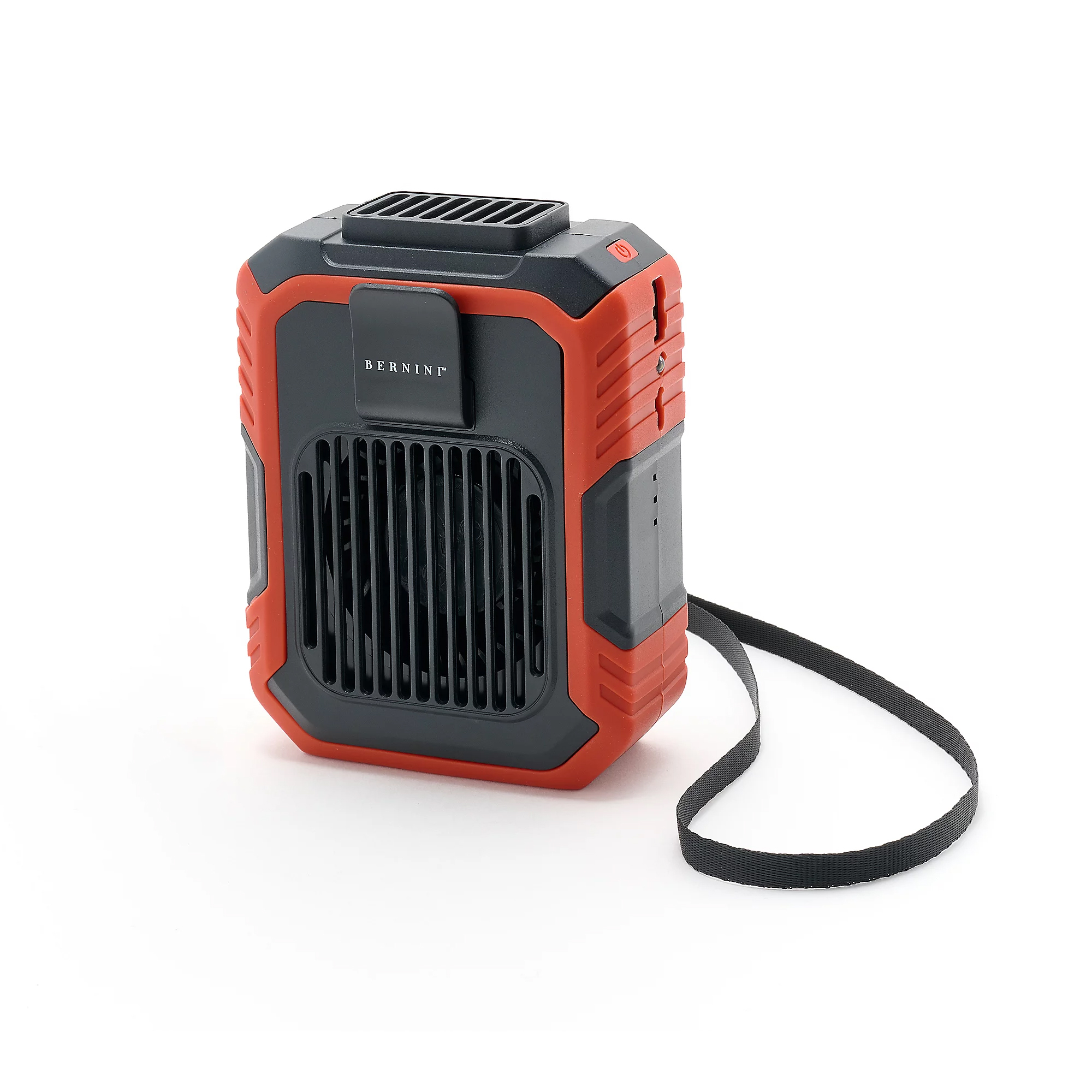 A compact, portable gardening fan with a red and black design, featuring a front grille, control button, and a strap for easy carrying.