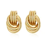 Gold-tone hoop earrings with an overlapping loop design.