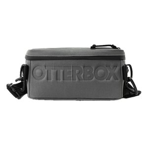 A gray OtterBox soft cooler with a rectangular shape, featuring a shoulder strap and embossed brand logo.