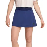 Blue athletic skirt with black Adidas logo, worn with a white top.